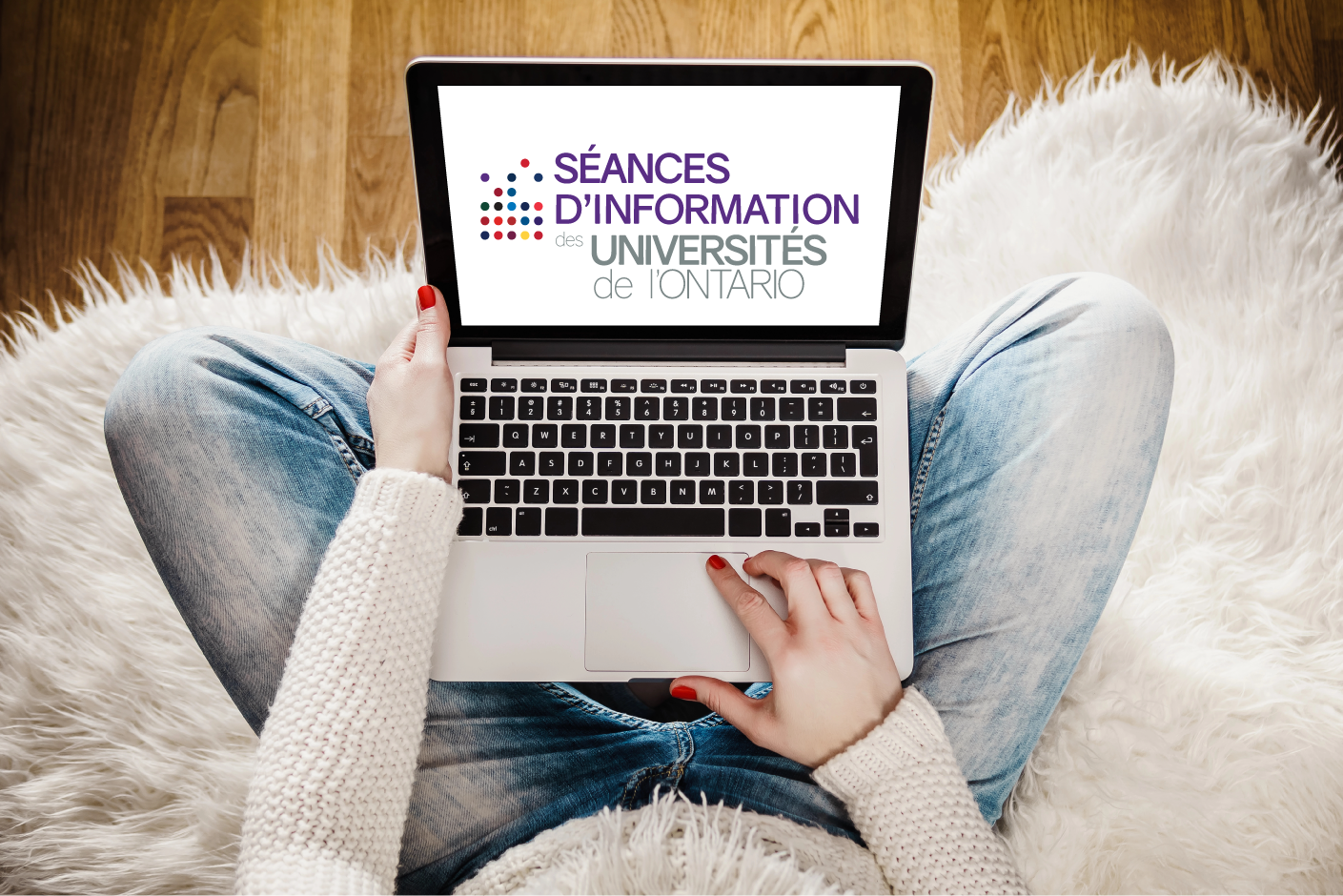 Student at home on computer showing OUIS logo